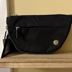 lululemon athletica Black Crossbody Bag with Gold Accents
